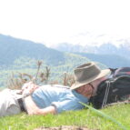 Walking Tours Pyrenees France - man sleeping near mountains